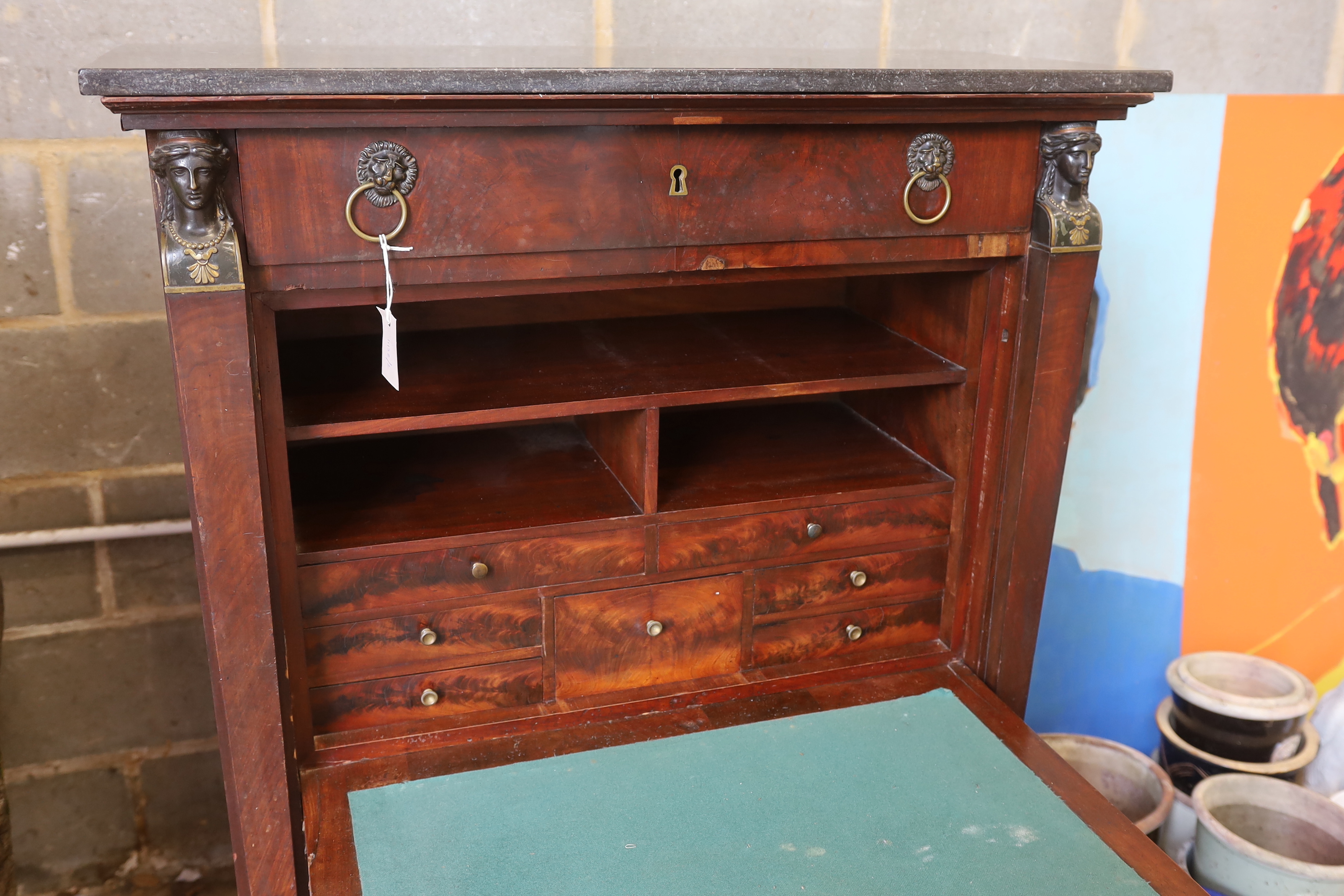 A 19th century French Empire marbled top secretaire à abbatant, width 96cm, depth 45cm, height 142cm